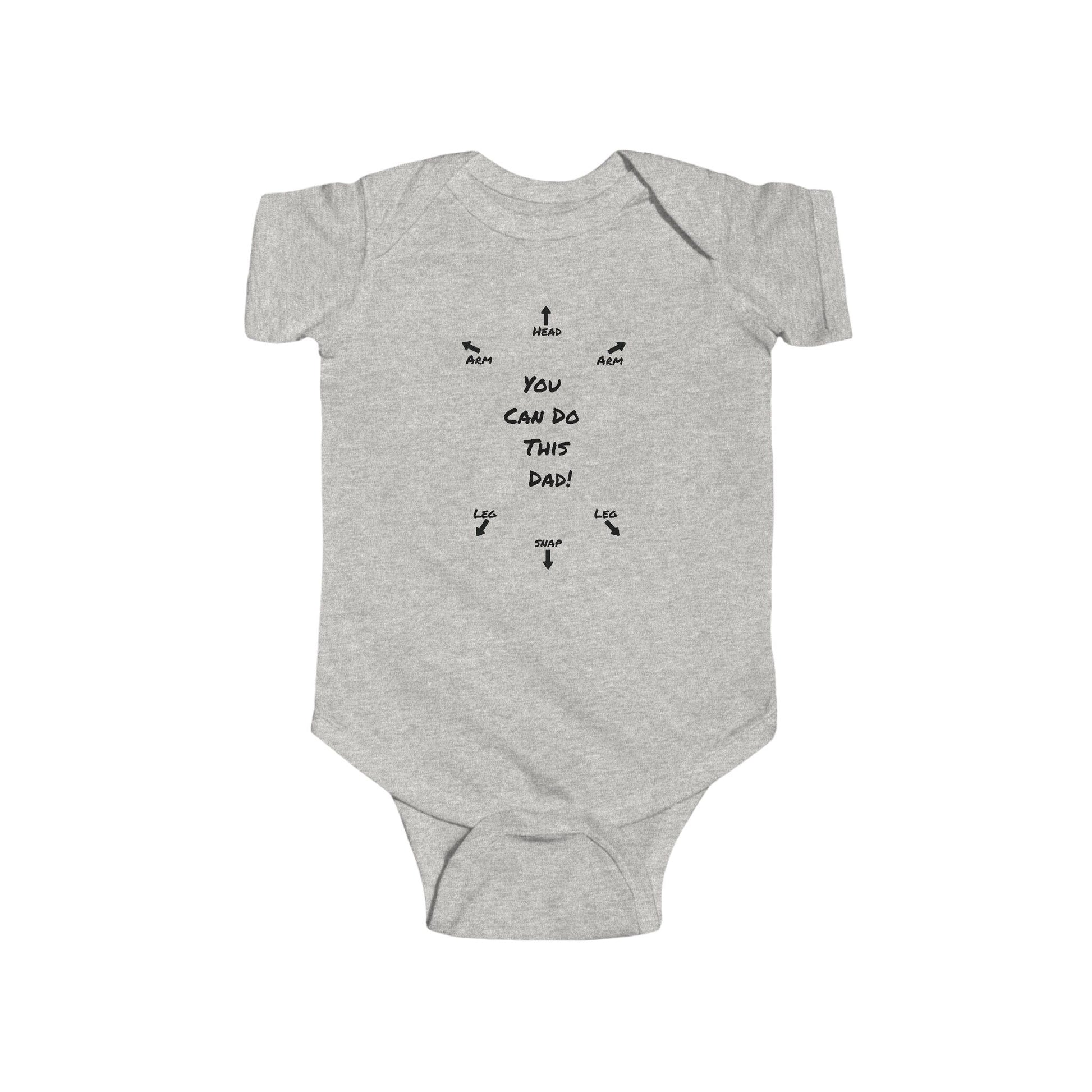 on the front of this custom infant onesie specifically meant for dads, are the words You can do this dad with arrows pointing where each leg and each arm goes along with were the babies head goes and where to close the snaps, a perfect diagram for a new father on how to put a onesie on a baby.
