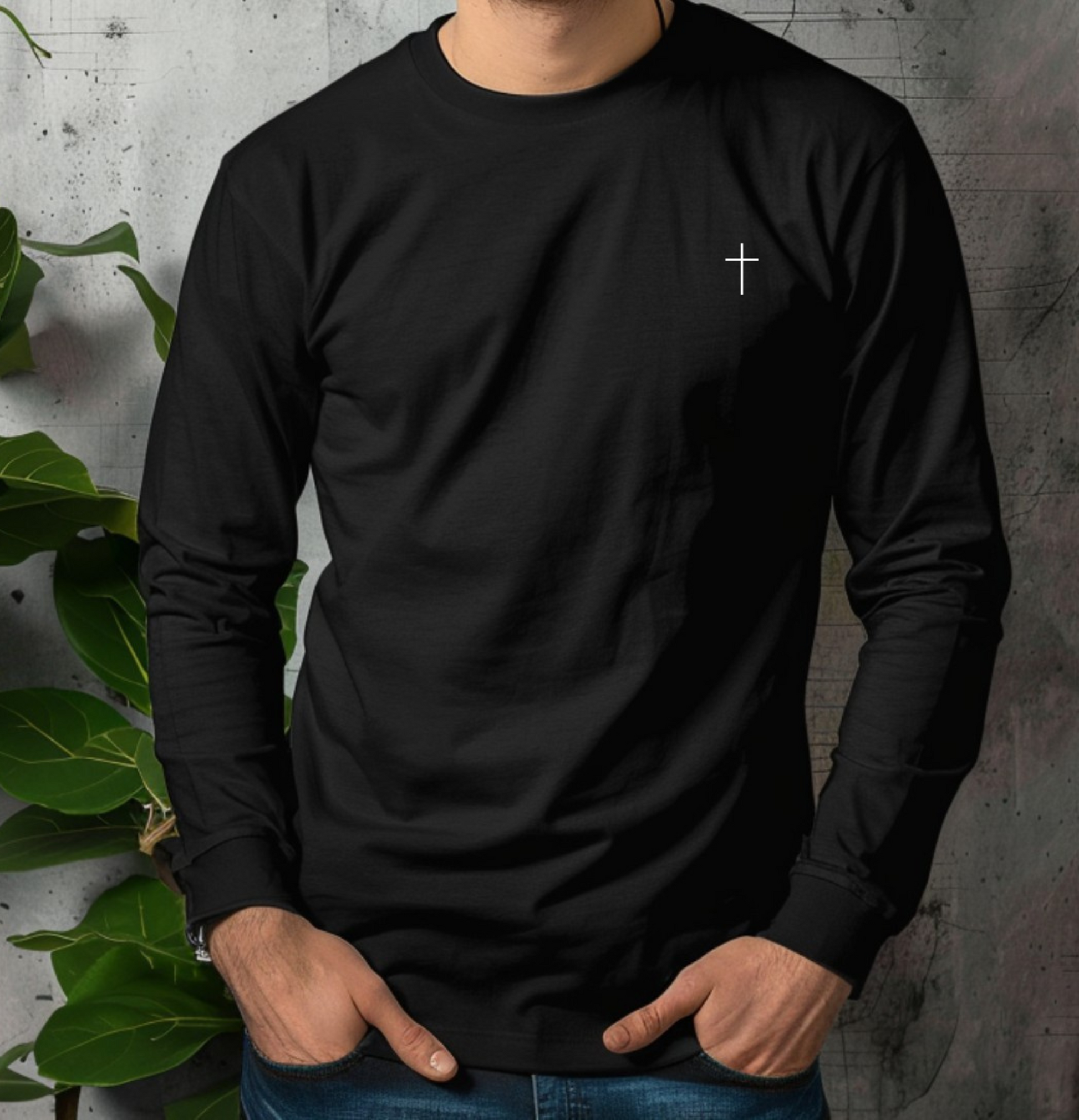 A classic unisex long sleeve Christian t-shirt features an embroidered white cross on the upper left chest of the shirt.