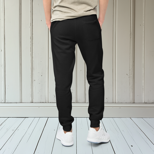 A pair of super soft ankle length Christian unisex sweatpants, there are two pockets on the front and one pocket on the back right, on the front left pocket is a embroidered white cross.