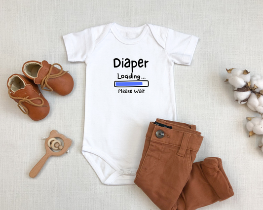 On the front of this custom infant onesie are the words Diaper loading please wait with an image of a battery life bar in baby blue.