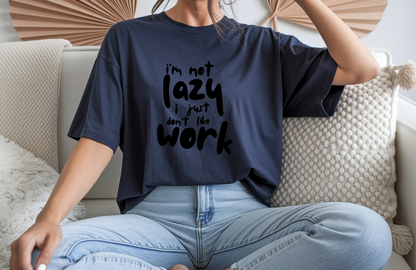 On the front of this custom short sleeve shirt in large bubble letters are the words I'm not lazy I just don't like work.