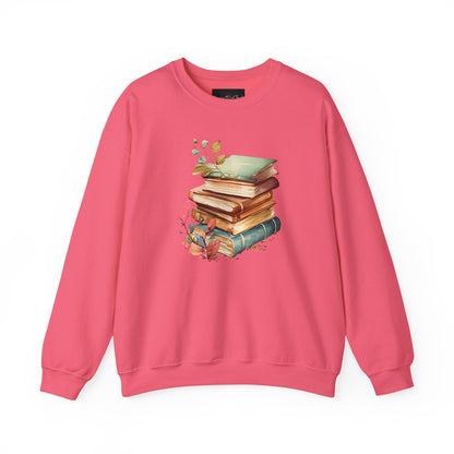 On the front of this custom book lovers sweatshirt is a stack of vintage books with a bunch of wildflowers all around the books.