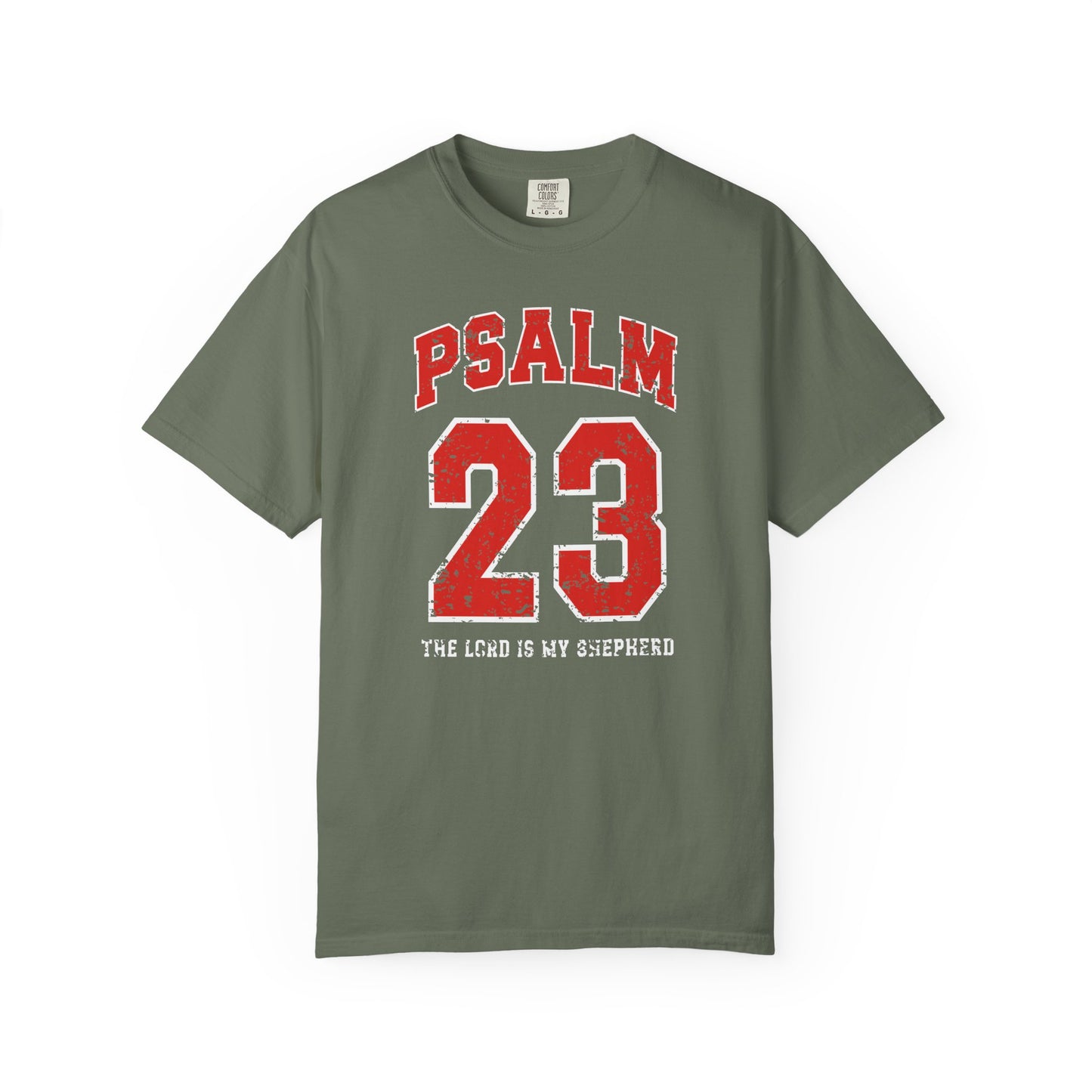 On the front side of this custom vintage t-shirt are the words Psalm 23 The Lord Is My Shepherd, it is with red and white block lettering.