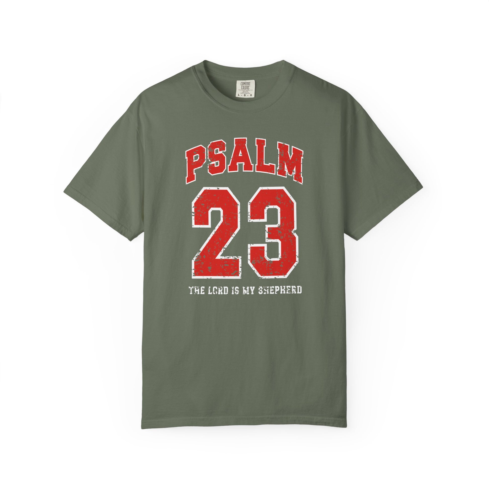 On the front side of this custom vintage t-shirt are the words Psalm 23 The Lord Is My Shepherd, it is with red and white block lettering.
