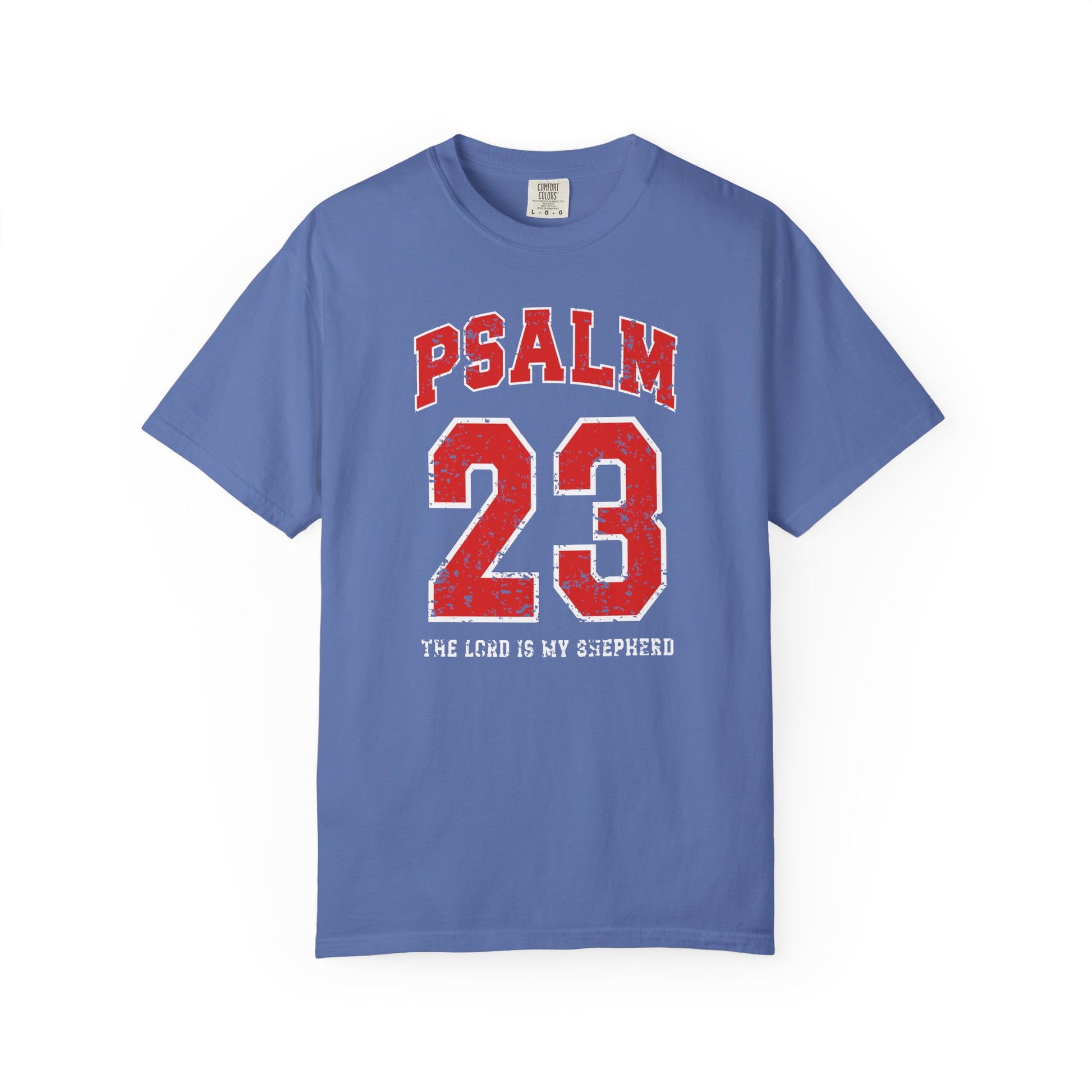 On the front side of this custom vintage t-shirt are the words Psalm 23 The Lord Is My Shepherd, it is with red and white block lettering.