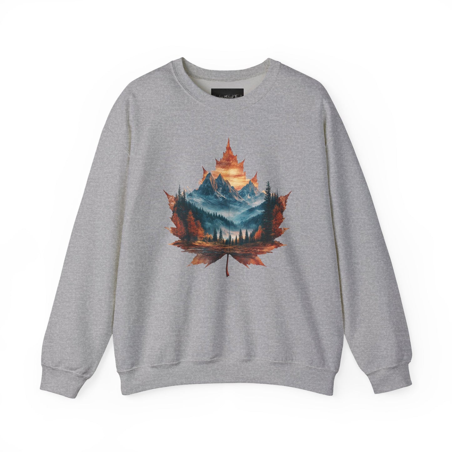 On the front of this Canadian pride sweatshirt is a large maple leaf with the inside of the leaf having a picture of the Rocky Mountains in the fall time.