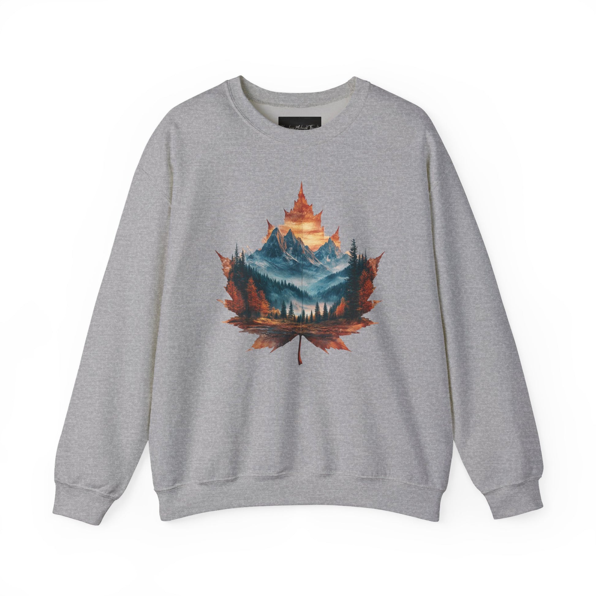 On the front of this Canadian pride sweatshirt is a large maple leaf with the inside of the leaf having a picture of the Rocky Mountains in the fall time.