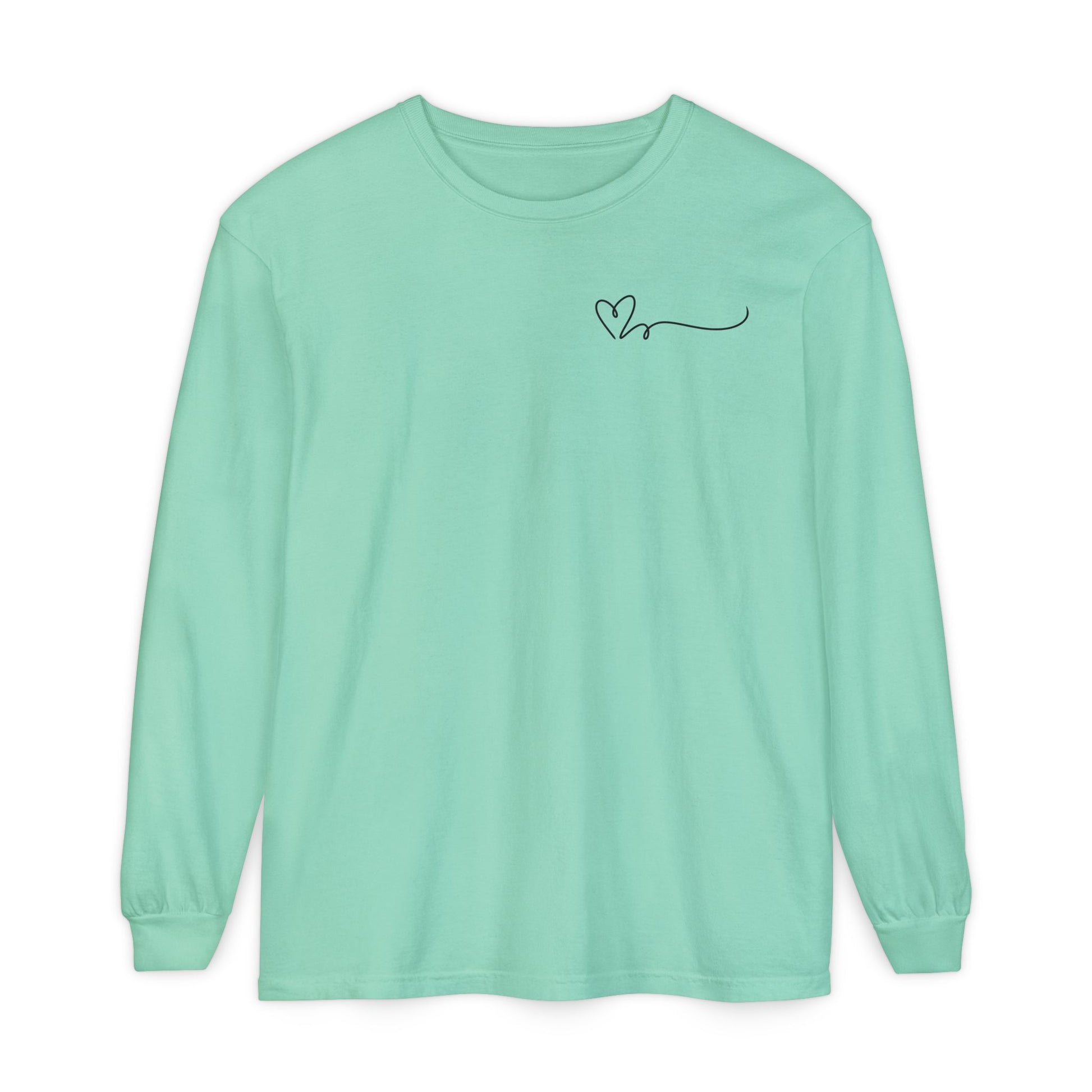 On the top right chest of this custom long sleeve t-shirt is a heart with a trail behind it signifying a heartbeat that you would see on a heart monitor. Perfect for health care workers and teachers.