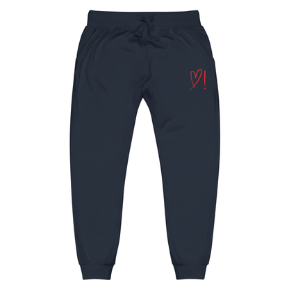 A pair of super soft ankle length unisex sweatpants, there are two pockets on the front and one pocket on the back right. There is a red heart with an exclamation point next to it embroidered on the front left pocket.