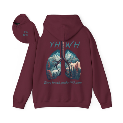 This custom Christian unisex hoodie features the letters YHWH on the front chest in light blue writing, and an image of lungs filled with a nature scene on the back with the words every breath speaks HIS name in the same color blue as the front.