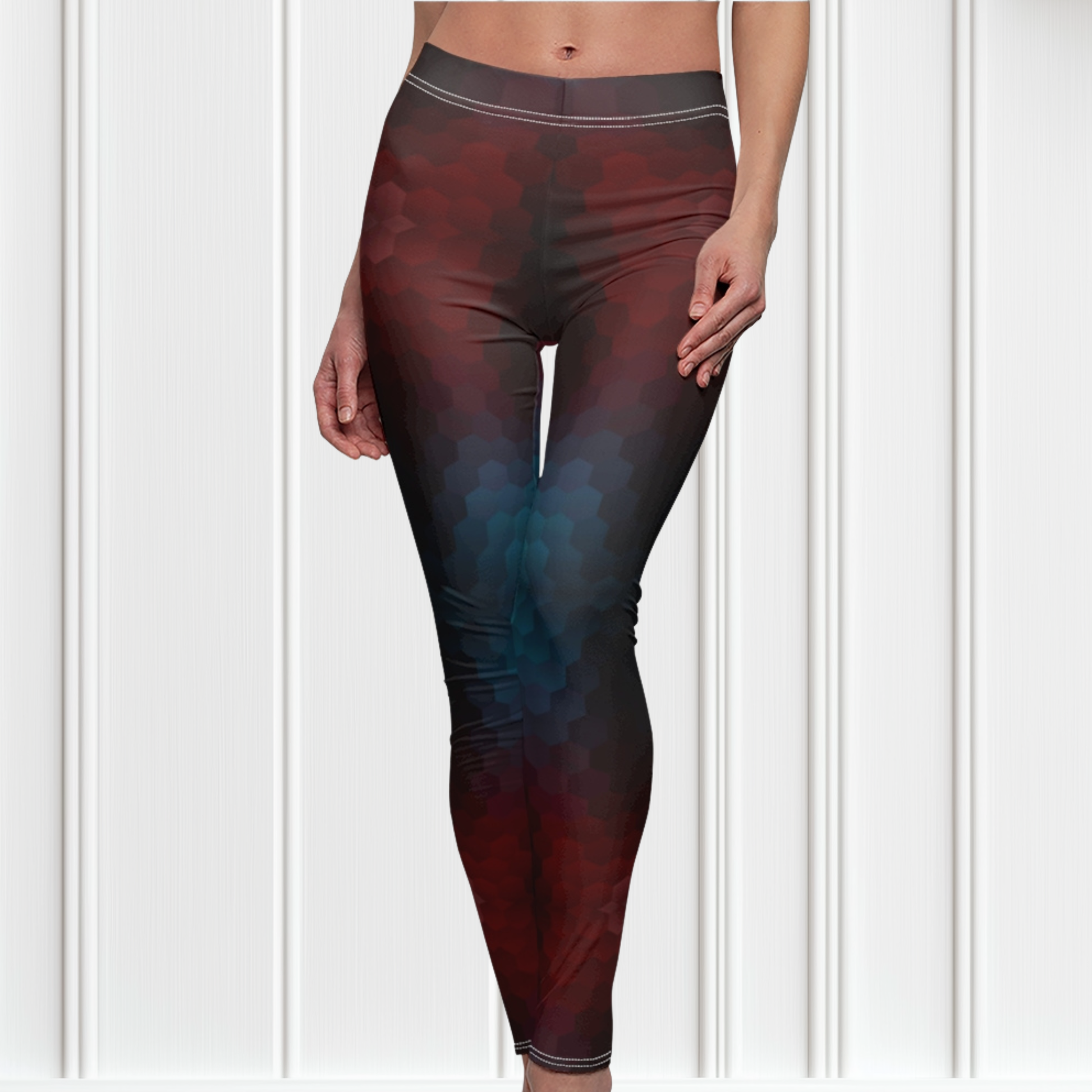 These custom high waisted women's leggings have an burgundy and teal octagon pattern throughout the entire pant that makes them look 3D with the colors shifting from lighter to darker in shade.