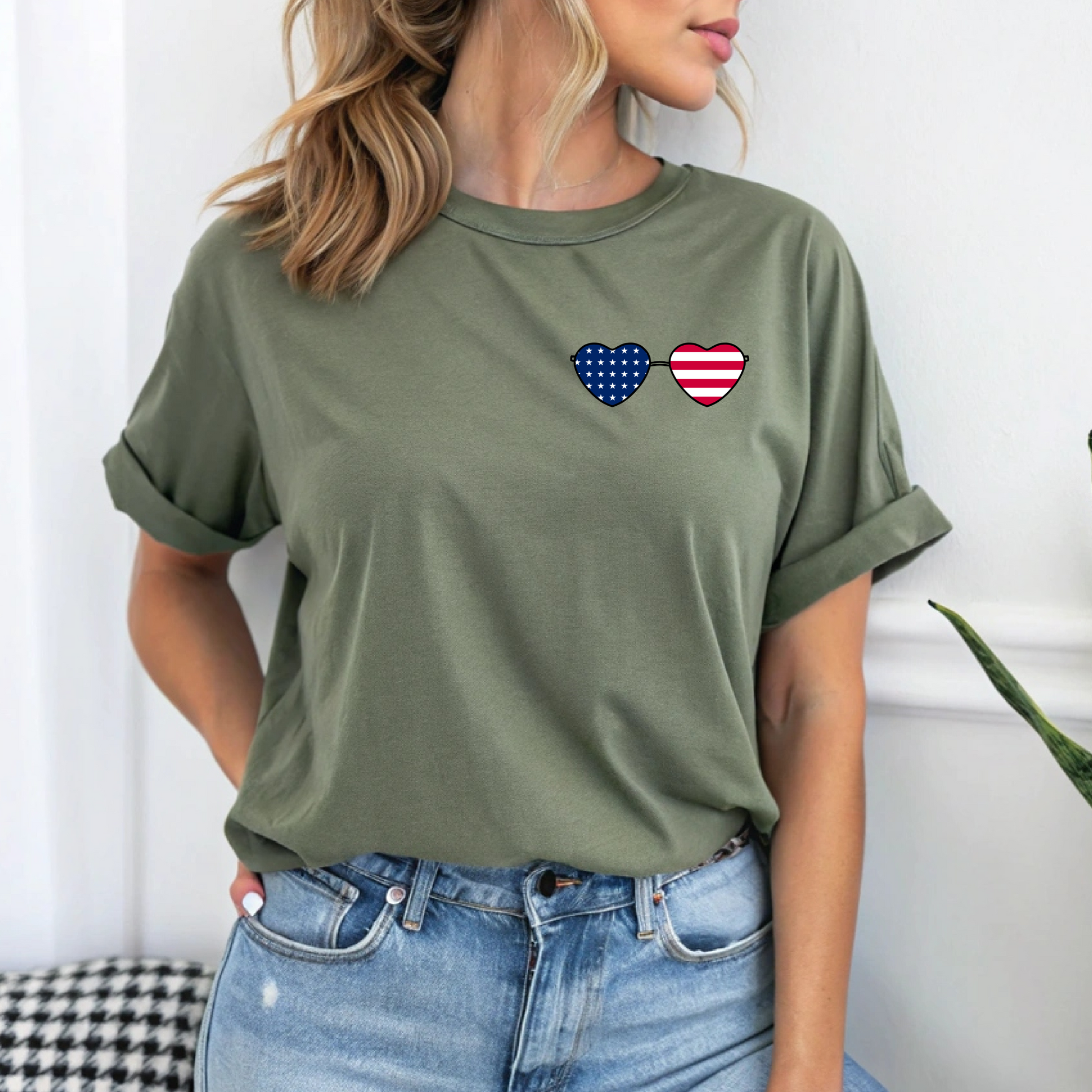 This super soft unisex t-shirt has a image of a pair of heart shaped sunglasses over the front left chest of the shirt, the American flag is inside the sunglasses. Perfect for 4th of July celebrations.