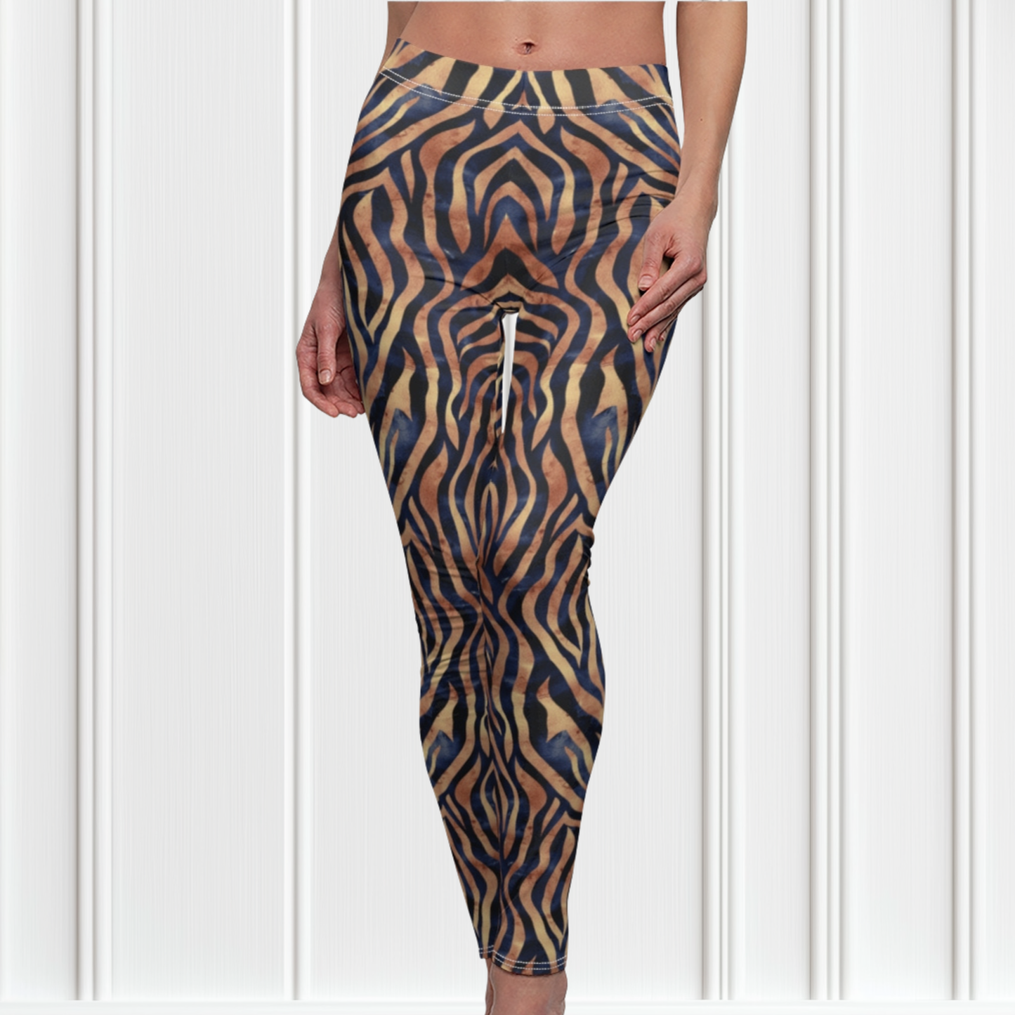Custom women's high waisted leggings that are beige in color with black lines overtop that look like animal print like that of tigers.