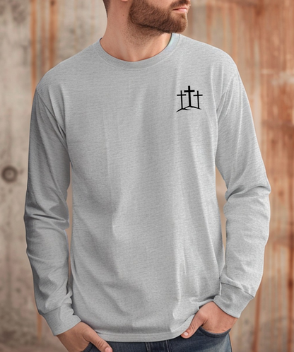 A classic Christian Unisex Ultra Cotton Long Sleeve Custom Tee featuring an image of three Jesus crosses on a hill on the top left chest of the shirt.