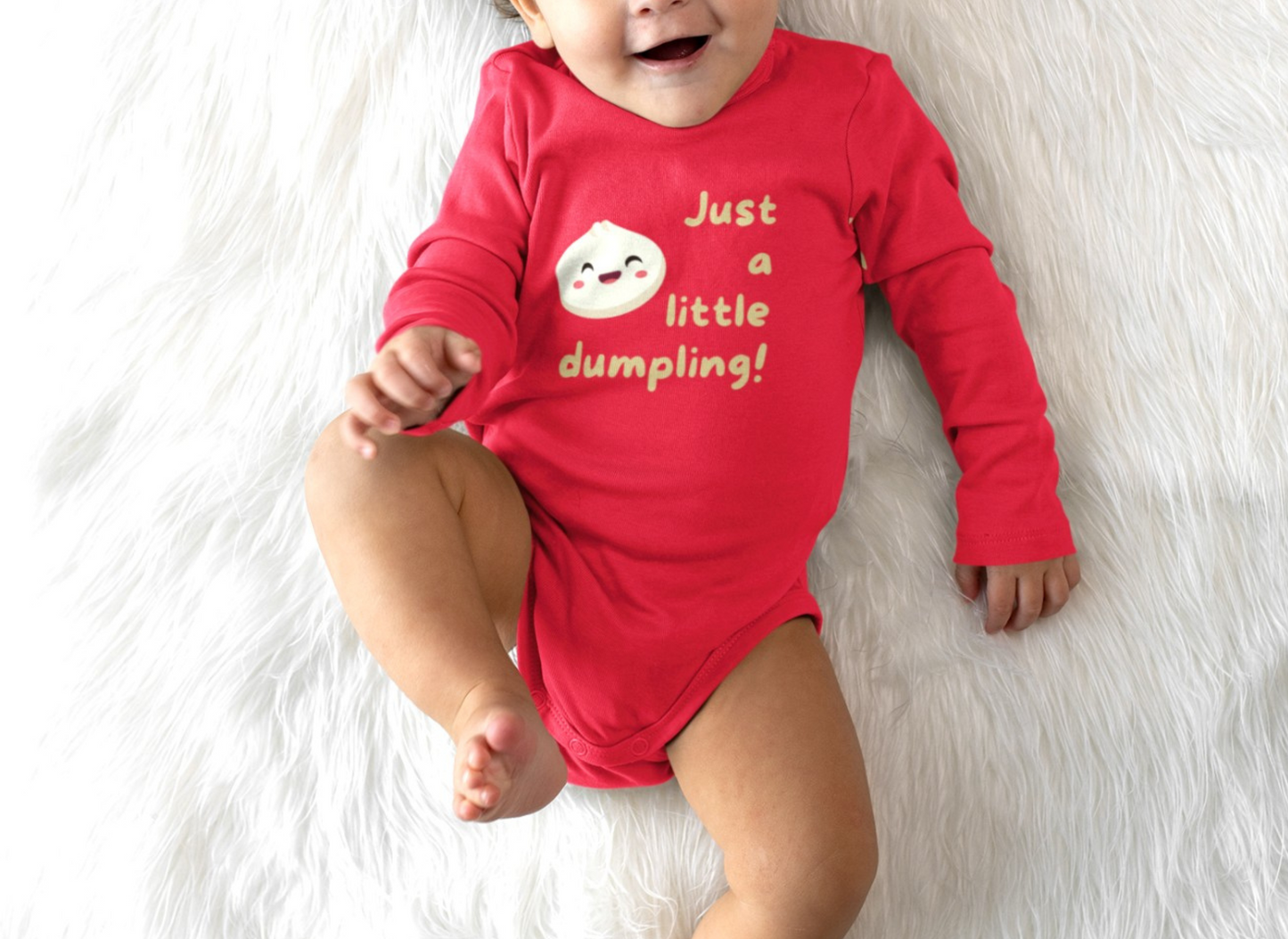 On the front of this custom infant onesie are the words Just A Little Dumpling with a image of a bao dumpling with a happy face next to the wording.
