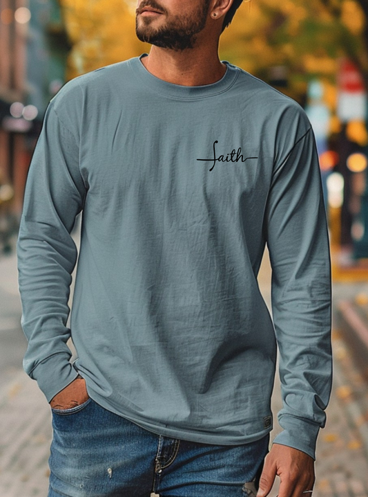 This custom Christian long sleeve t-shirt has the word Faith embroidered in black thread on the top left chest, the word faith is embroidered in a cursive font.