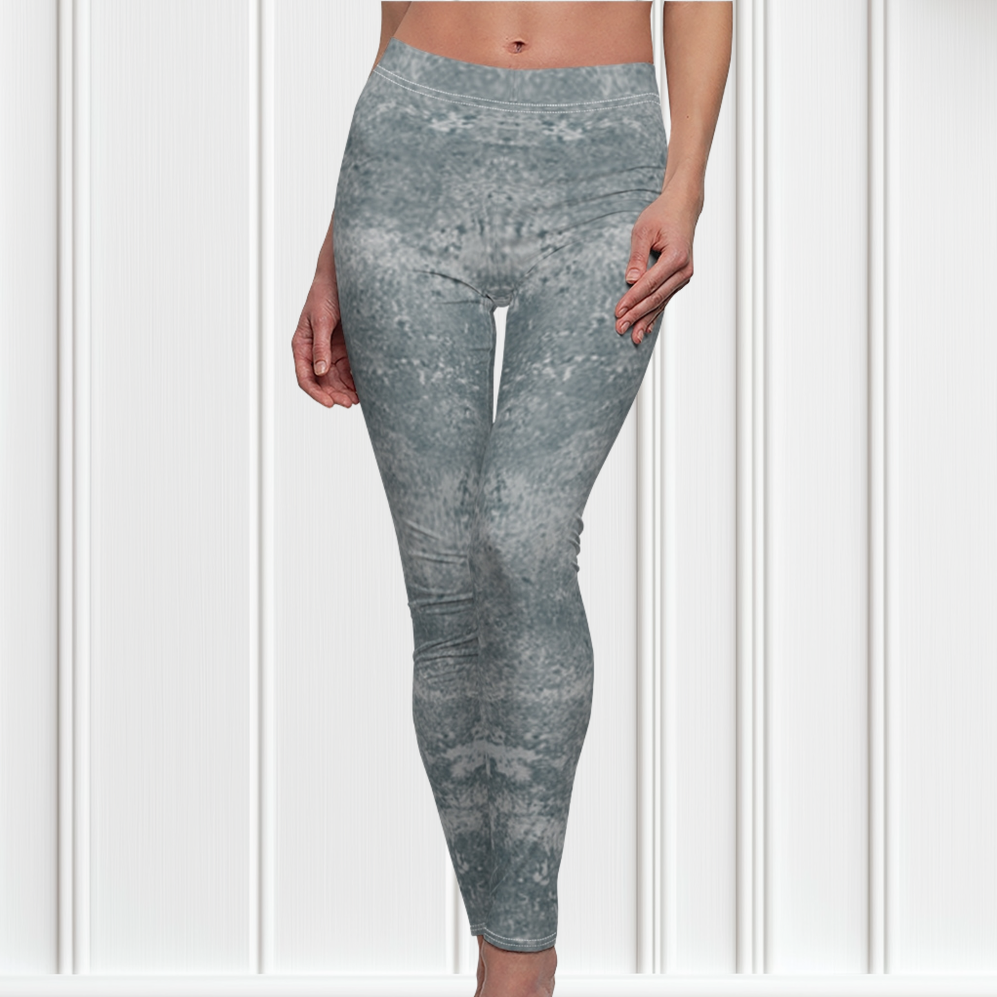 A pair of women's custom high waisted leggings, they have a washed grey pattern all over the pants.