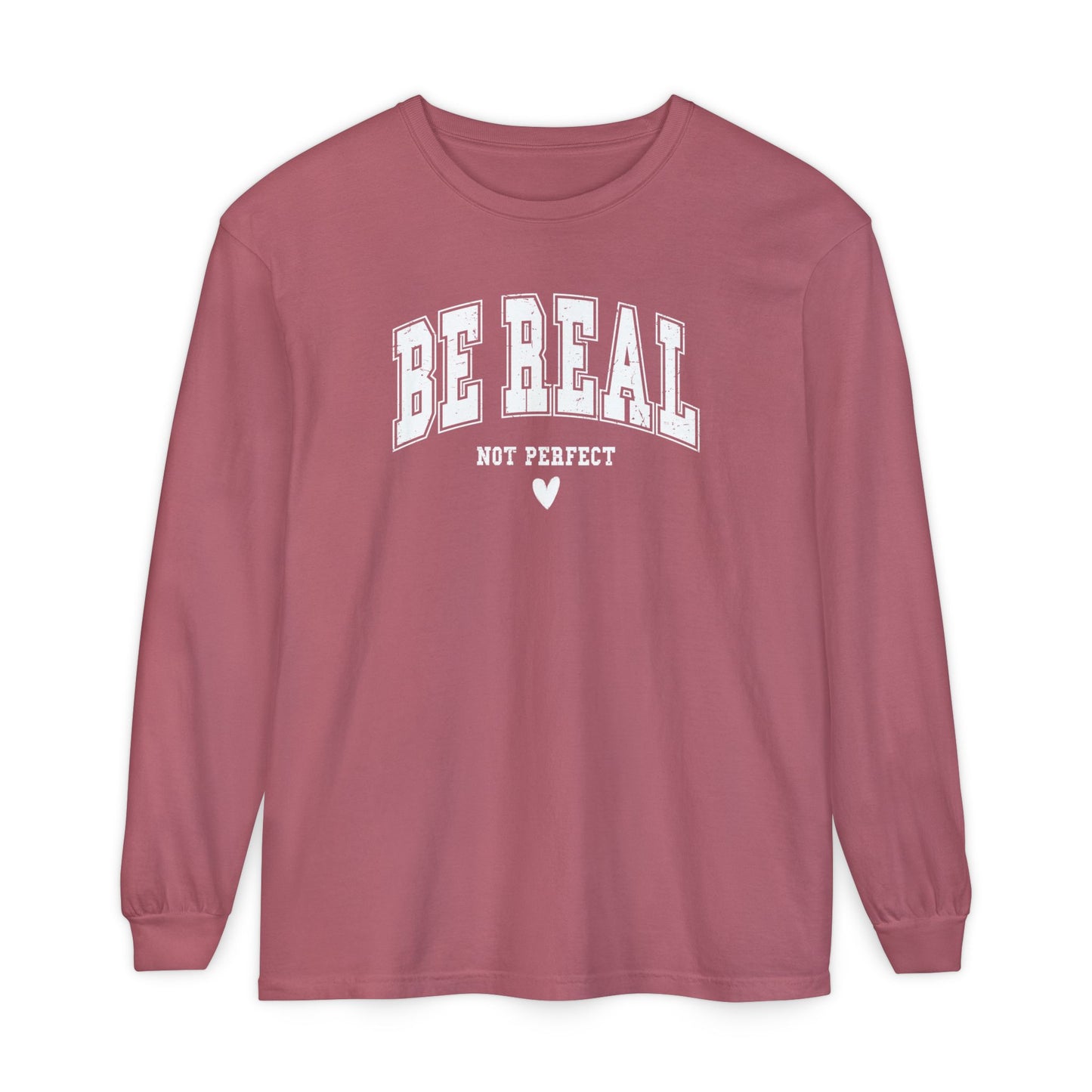 On the front of this custom unisex long sleeve shirt are the words Be Real in large bubble font with the words not perfect underneath the bubble letters, on the bottom there is a heart.