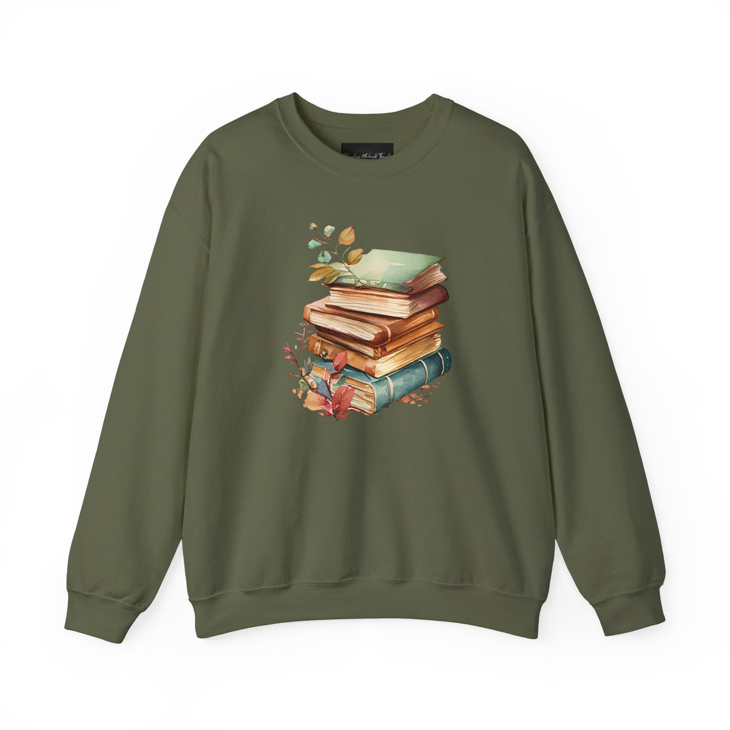 On the front of this custom book lovers sweatshirt is a stack of vintage books with a bunch of wildflowers all around the books.