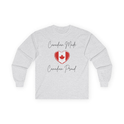 On the front of this custom Canadian patriotic long sleeve t-shirt are the words Canadian Made Canadian Proud in a beautiful cursive font, there is a Canadian flag in the middle that is in the shape of a heart.