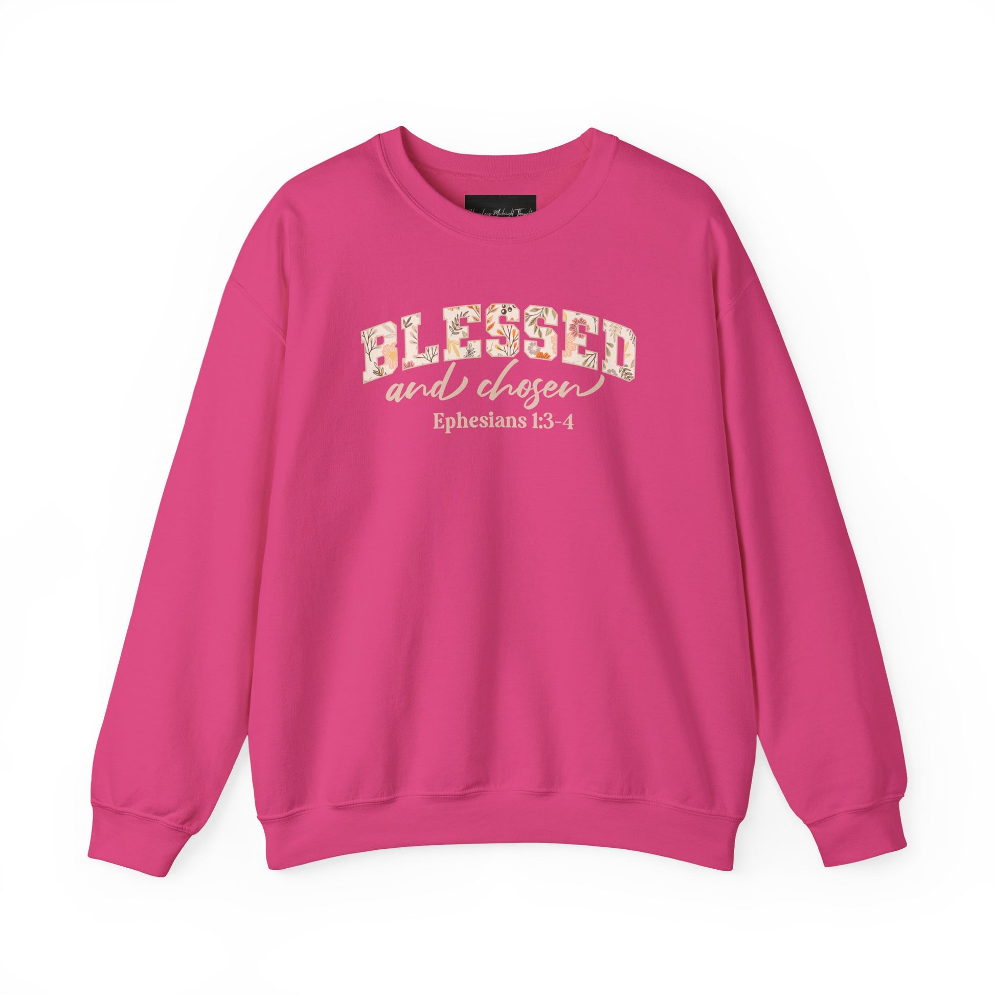 On the front of this custom Christian sweatshirt is the bible verse Blessed and Chosen Ephesians 1:3-4 with the word Blessed being in large bubble letters with a floral pattern on the inside of the letters.