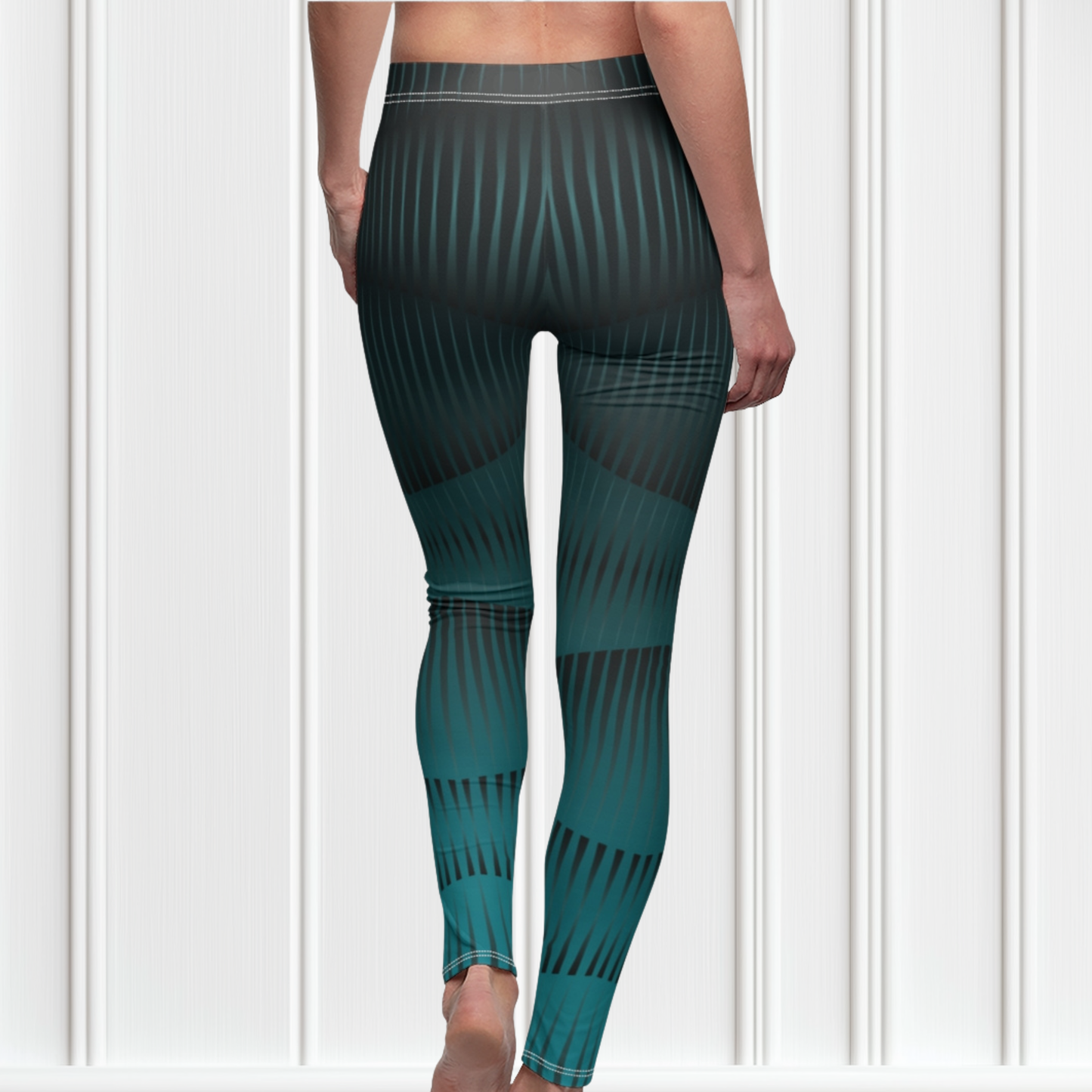Custom high waisted women's handmade leggings with a custom blue design that features different shades of blue lines that are throughout the pants making the leggings exaggerate a women's curves.