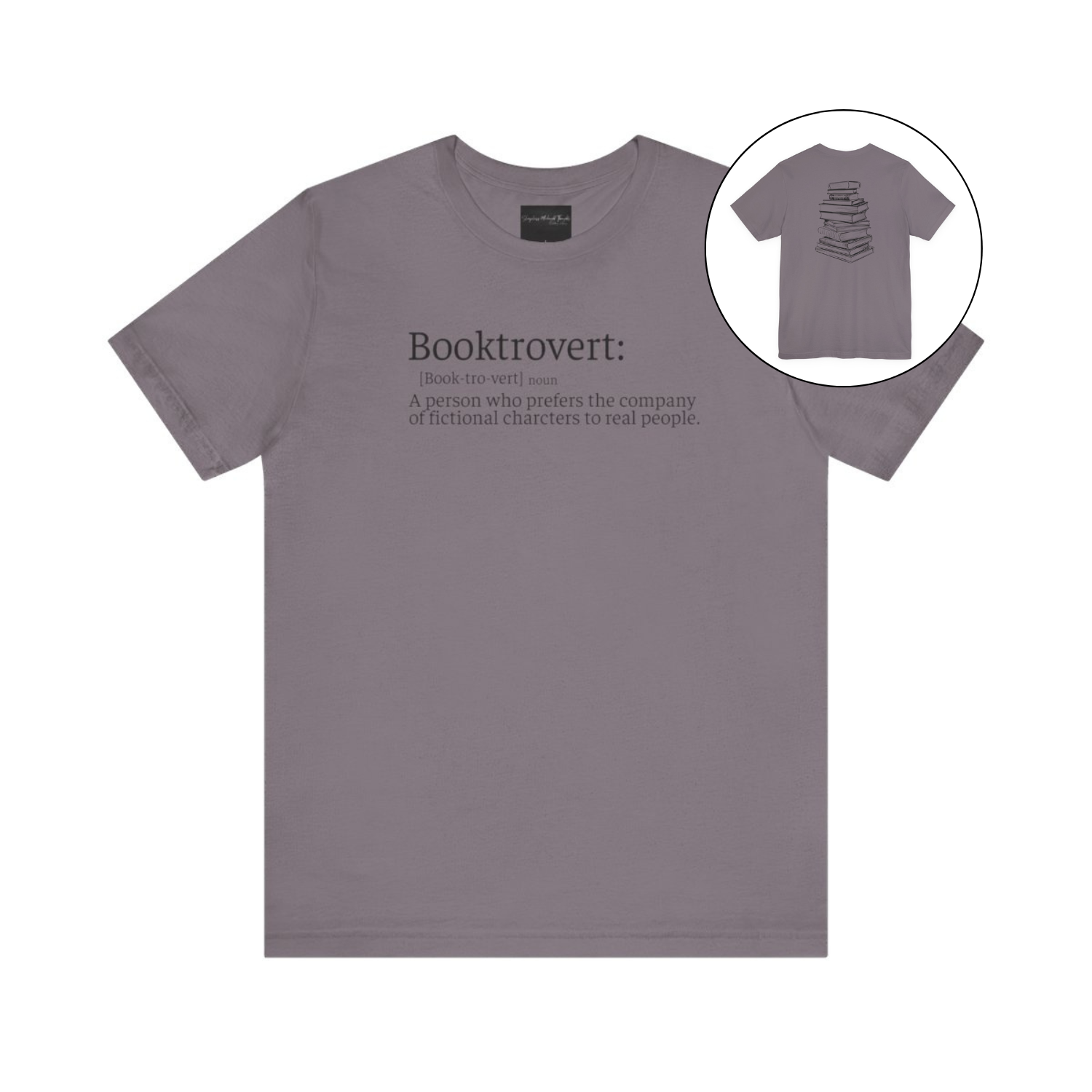 On the front of this custom unisex short sleeve shirt is the word booktrovert with the definition of the word underneath, on the back of the shirt is an image of a large stack of books.