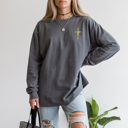 On the front of this custom Christian long sleeve shirt is a gold cross over the top left chest of the shirt.