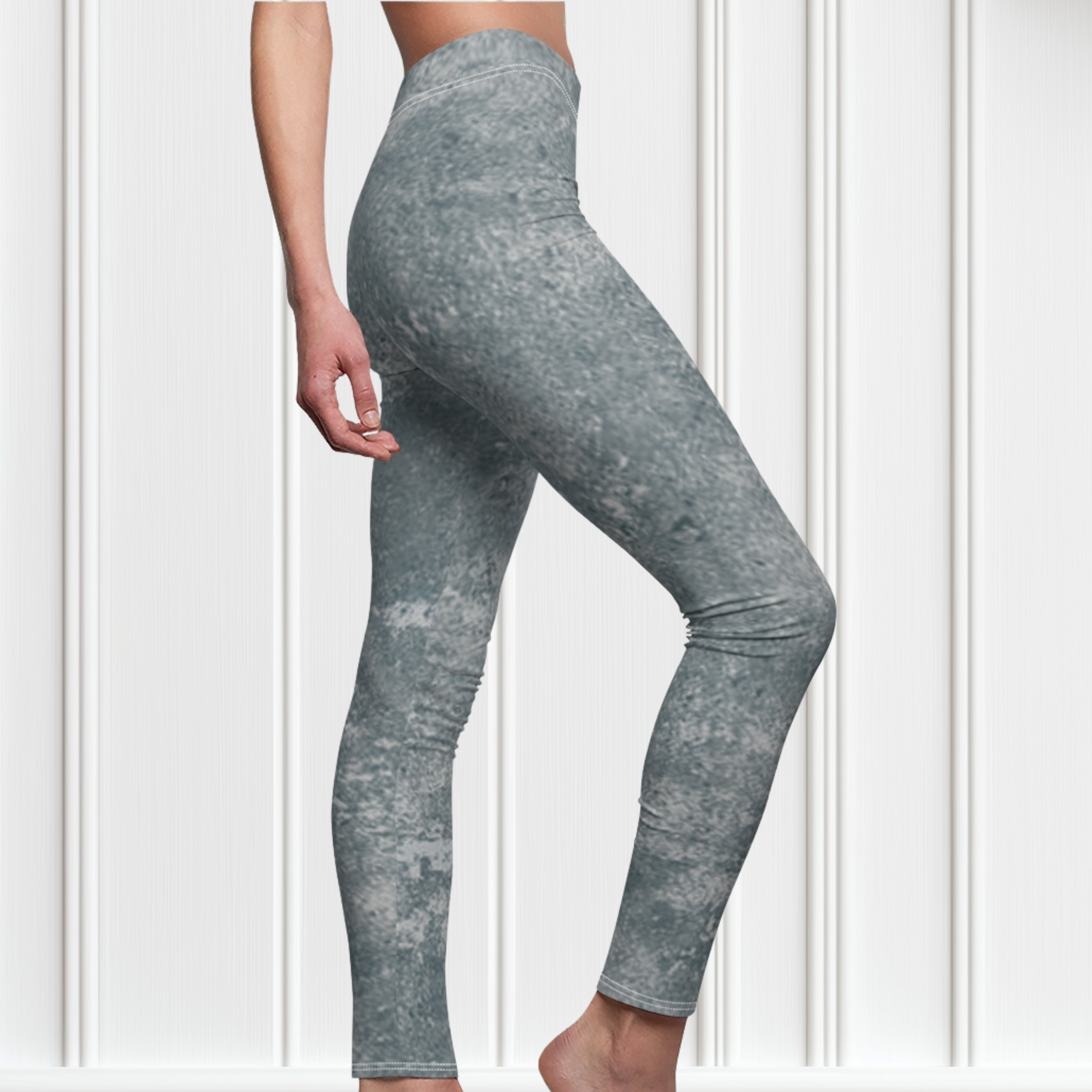 A pair of women's custom high waisted leggings, they have a washed grey pattern all over the pants.
