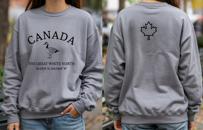 On the front of this unisex super soft Canadian sweatshirt is the word Canada in large text on the top with an image of a Canadian Goose underneath. Under the Goose are the words The Great White North with Canada's geological location under that.
