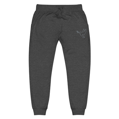 A pair of super soft ankle length unisex Christian sweatpants, there are two pockets on the front and one pocket on the back right, on the front left pocket  there is an embroidered dove with a fig leaf in silver thread.