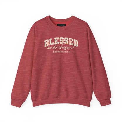 On the front of this custom Christian sweatshirt is the bible verse Blessed and Chosen Ephesians 1:3-4 with the word Blessed being in large bubble letters with a floral pattern on the inside of the letters.