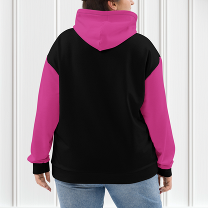 A women's custom oversized handmade hoodie, on the front and the back of the hoodie is the color black, the sleeves, front kangaroo pocket and hood are all a bright pink color, the strings of the sweater are black.