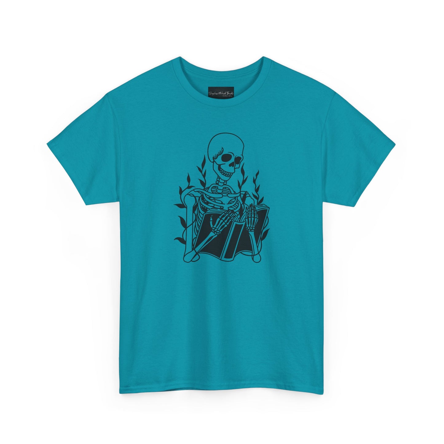 On the front of this custom unisex short sleeve shirt is a large image of a skeleton reading a book, there are vines with leaves on them behind the skeleton.