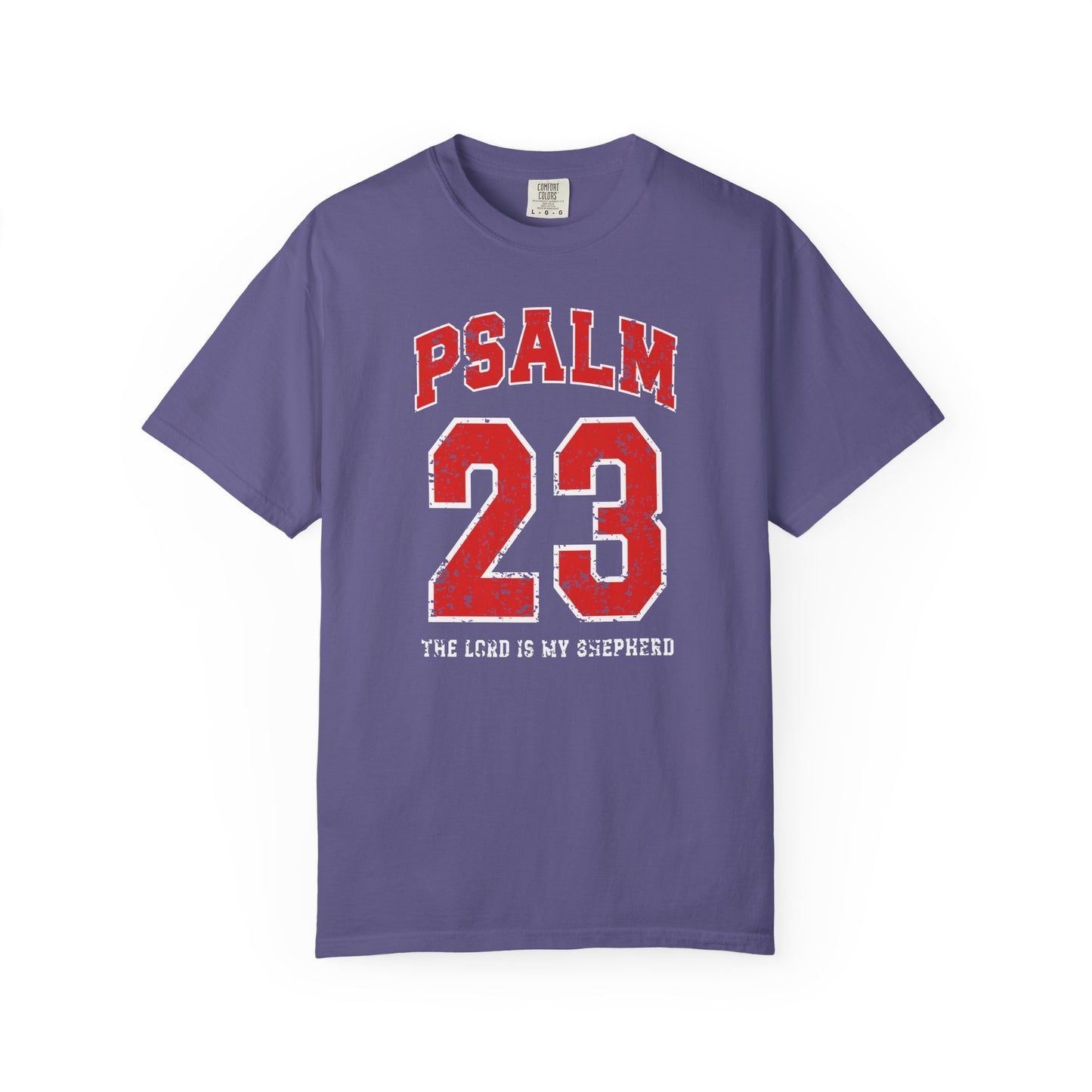 On the front side of this custom vintage t-shirt are the words Psalm 23 The Lord Is My Shepherd, it is with red and white block lettering.