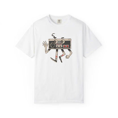 On the front of this custom vintage gaming short sleeve shirt is an image of a old school Nintendo controller, the controller has arms and legs and a face that makes it look like a cartoon character.