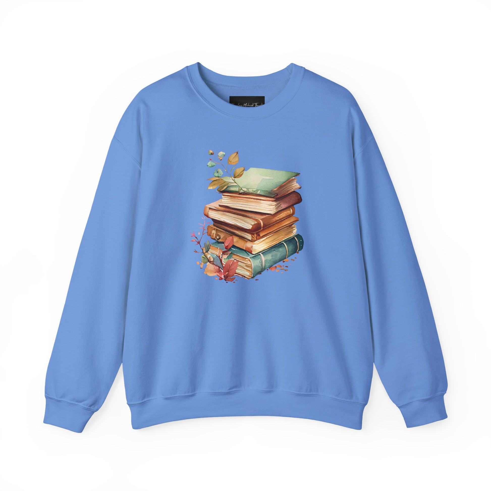 On the front of this custom book lovers sweatshirt is a stack of vintage books with a bunch of wildflowers all around the books.