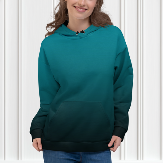 This custom handmade unisex hooded sweatshirt has an ombre pattern with the top of the hoodie being a bright turquoise blue then it fading to a black at the bottom of the hoodie, the strings on the sweater are black to match the bottom.