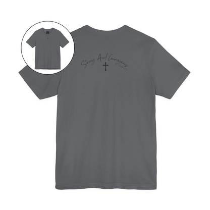 On the front center of this Christian shirt is a small Jesus cross, on the back of the is short sleeve tee is the scripture Strong and Courageous Joshua 1:9