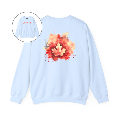 On the front of this Canadian pride pullover sweater is Canada in red and beige letters with a maple leaf in the middle, on the back of the sweater is a large maple leaf that looks like it has been spray painted onto the sweater in red and beige.