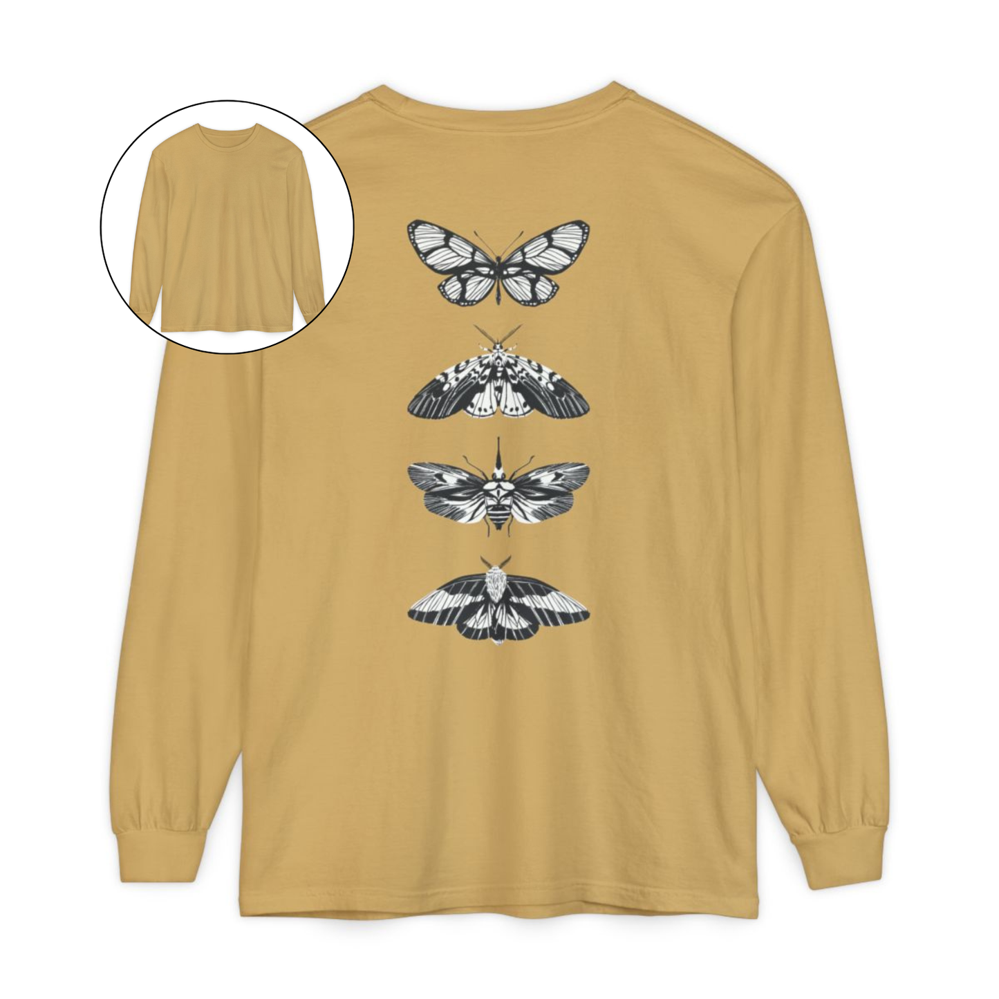 On the back of this long sleeve women's shirt right in between the shoulder blades is a row of black and white butterflies, starting at the top of the back and headed to the bottom of the shirt.