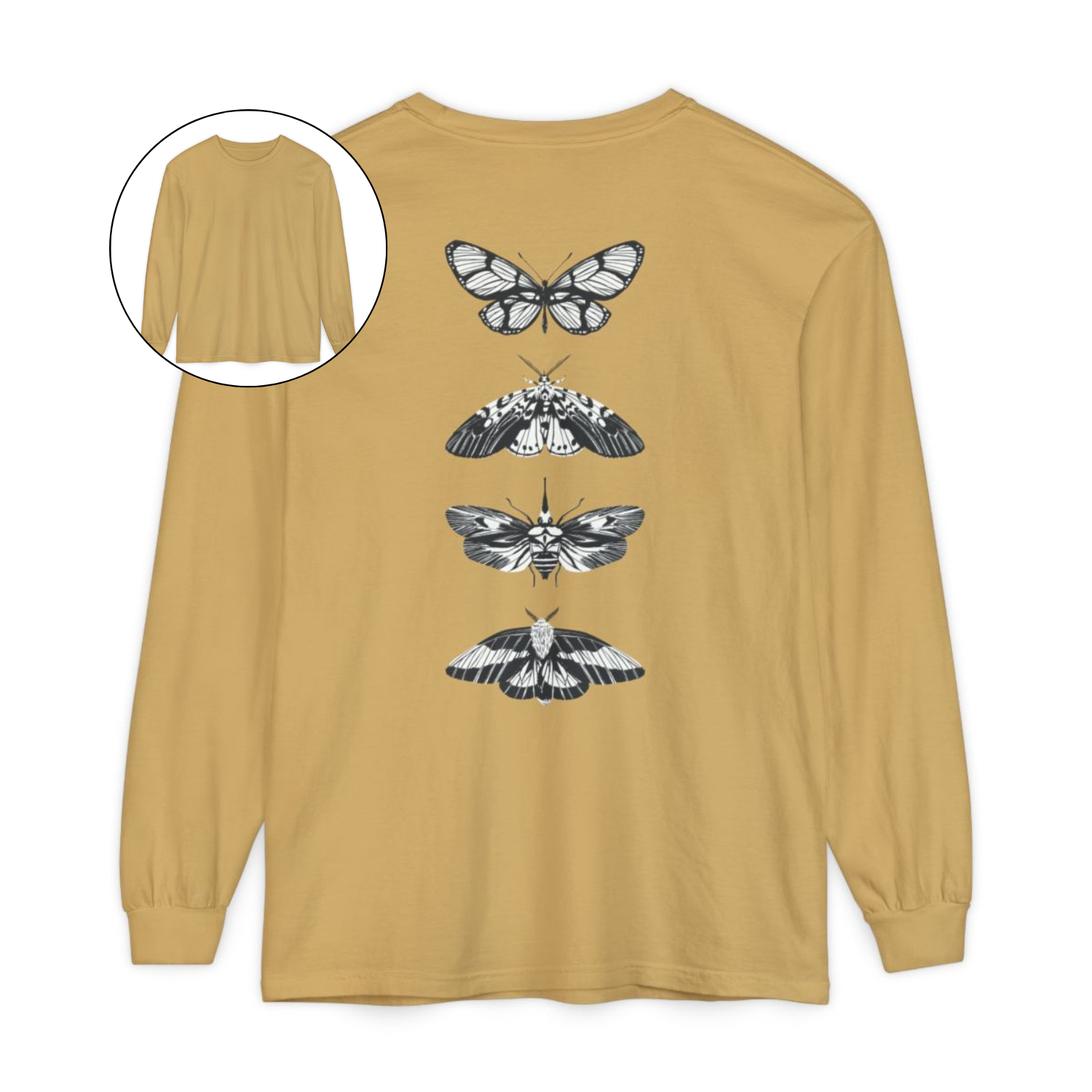 On the back of this long sleeve women's shirt right in between the shoulder blades is a row of black and white butterflies, starting at the top of the back and headed to the bottom of the shirt.
