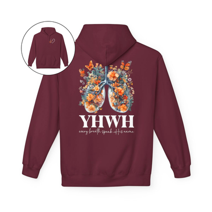 On the front of this custom women's Christian hoodie is a large heart that has a Jesus cross in the center of it, there are two butterflies around the heart. On the back of the sweater is an image of a pair of human lungs made from flowers and butterflies, under the image it says YHWH every breath speaks His name.