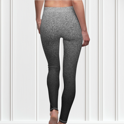 the women's high waisted custom leggings has a ombre static pattern with the top of the pants being a light grey with black static going through it to the bottom of the leggings being black and grey static going through it.