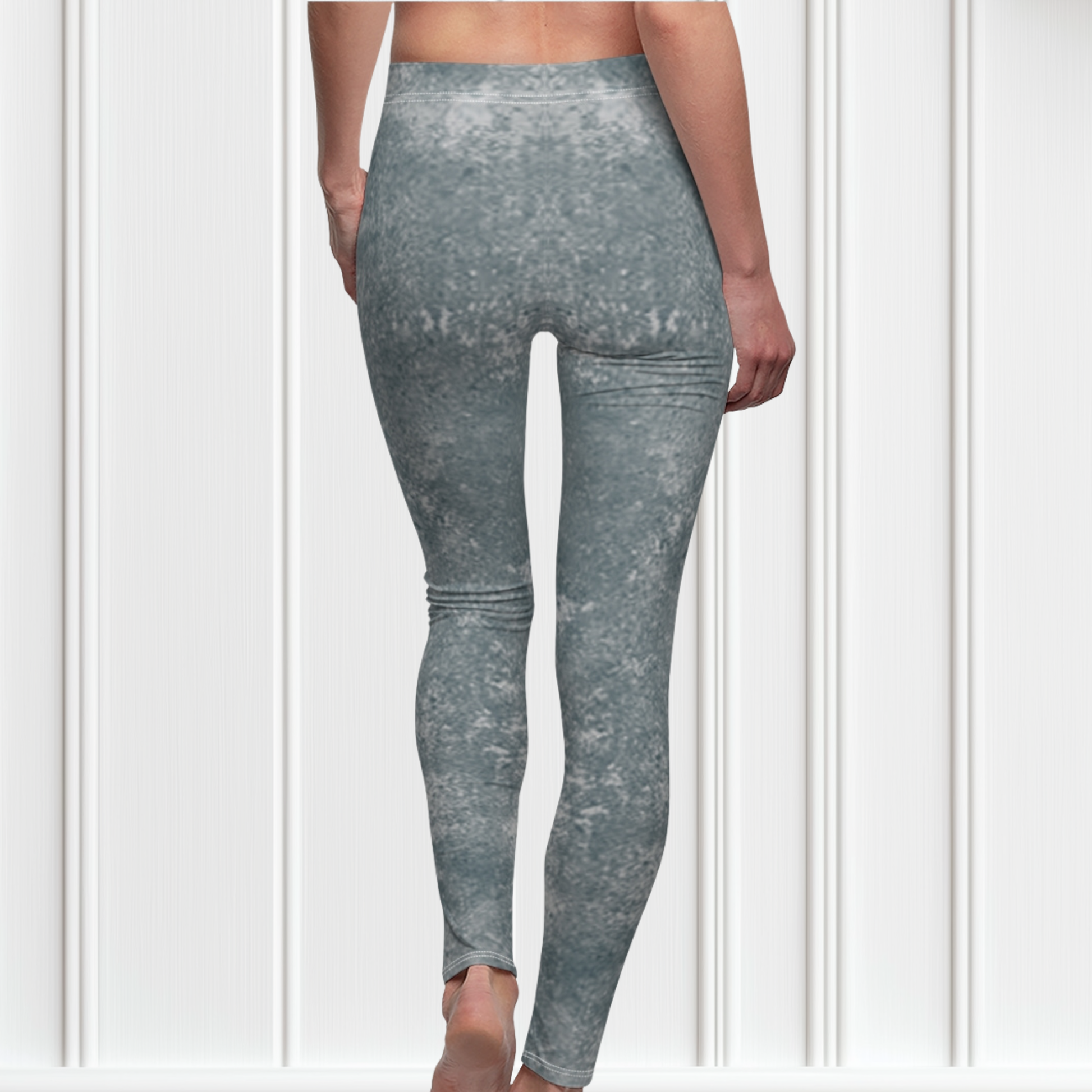 A pair of women's custom high waisted leggings, they have a washed grey pattern all over the pants.