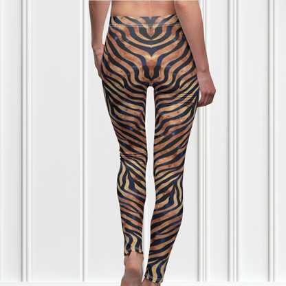 Custom women's high waisted leggings that are beige in color with black lines overtop that look like animal print like that of tigers.