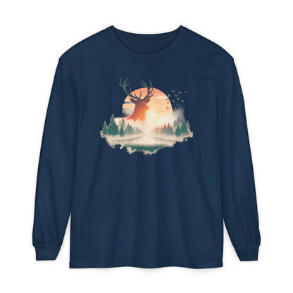 On the front of this custom unisex long sleeve shirt is beautiful landscape at dawn, there is a river in the middle with pine trees on either side, the sun is setting in the background with a large elk in the distance standing in front of the sun.