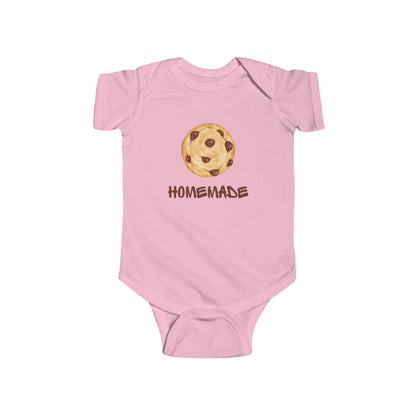 This adorable custom super soft baby onesie that features an image of a chocolate chip cookie in the middle with the word 'homemade' in brown writing underneath the image.