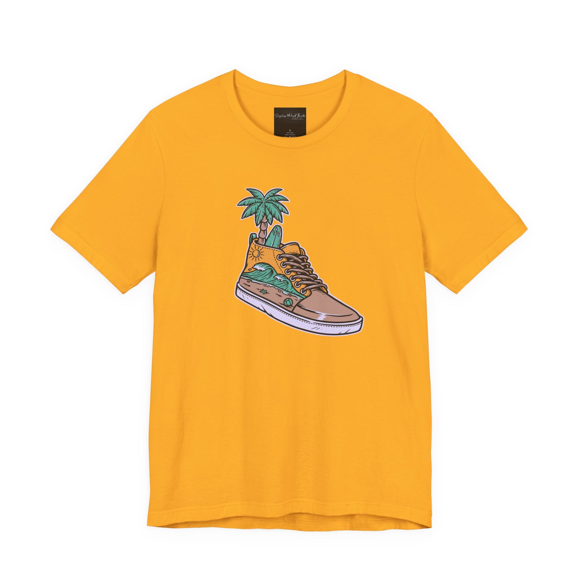 On the front of this custom handmade short sleeve shirt is an image of a high top running shoe with ocean waves running along the side of the shoe, coming out of the top of the shoe where your foot goes is a palm tree and a surf board.