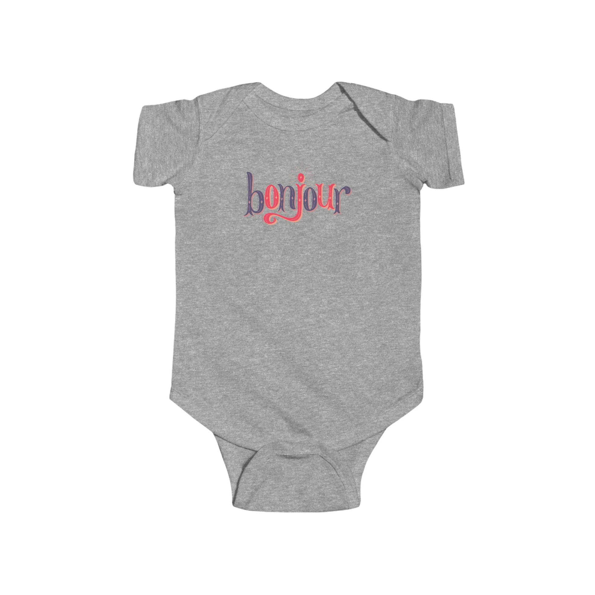 A custom infant onesie that has shirt sleeves and three buttons on the bottom, across the front of this custom baby bodysuit is the word bonjour in blue and red writing.